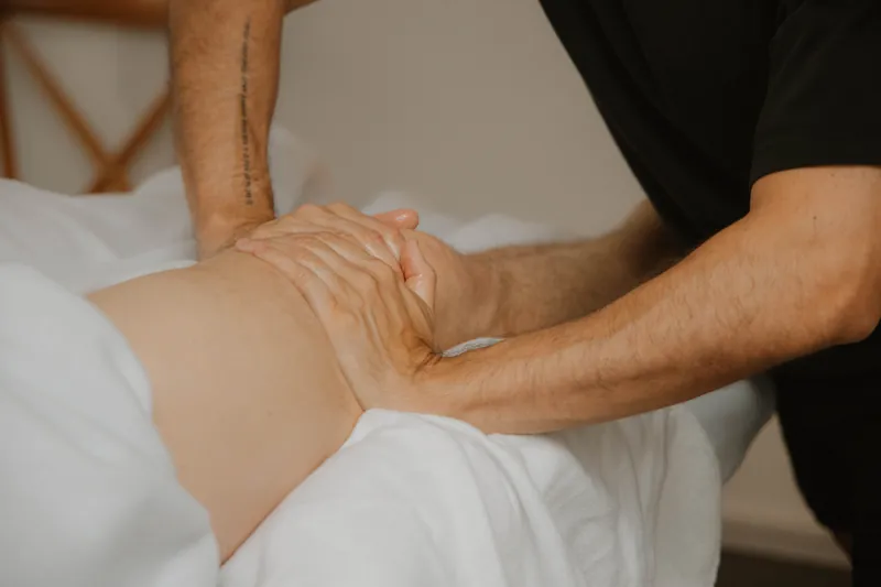 Slow pressure into the lower back and hip